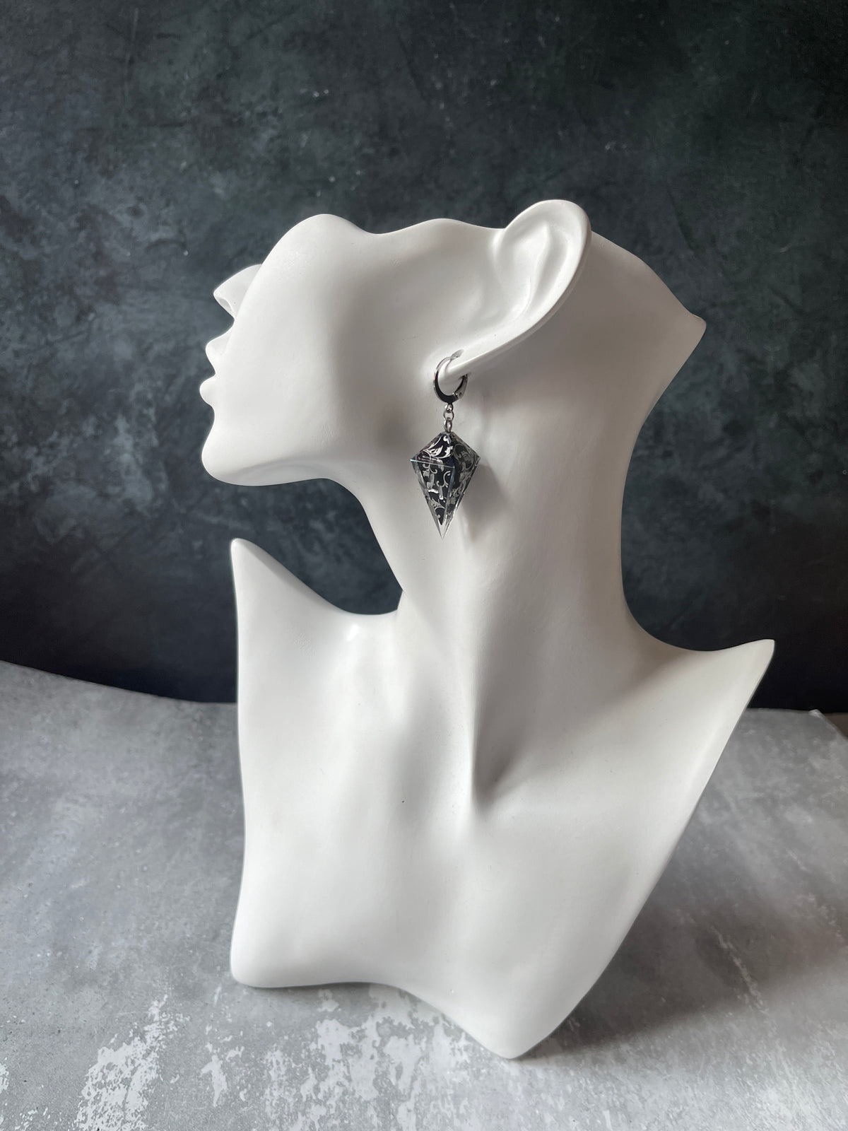 Silvery Barbs D4 dice earrings
