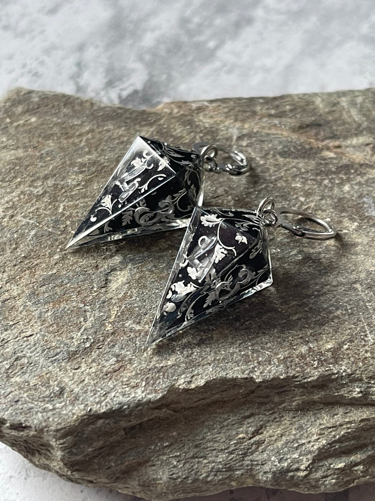 Silvery Barbs D4 dice earrings