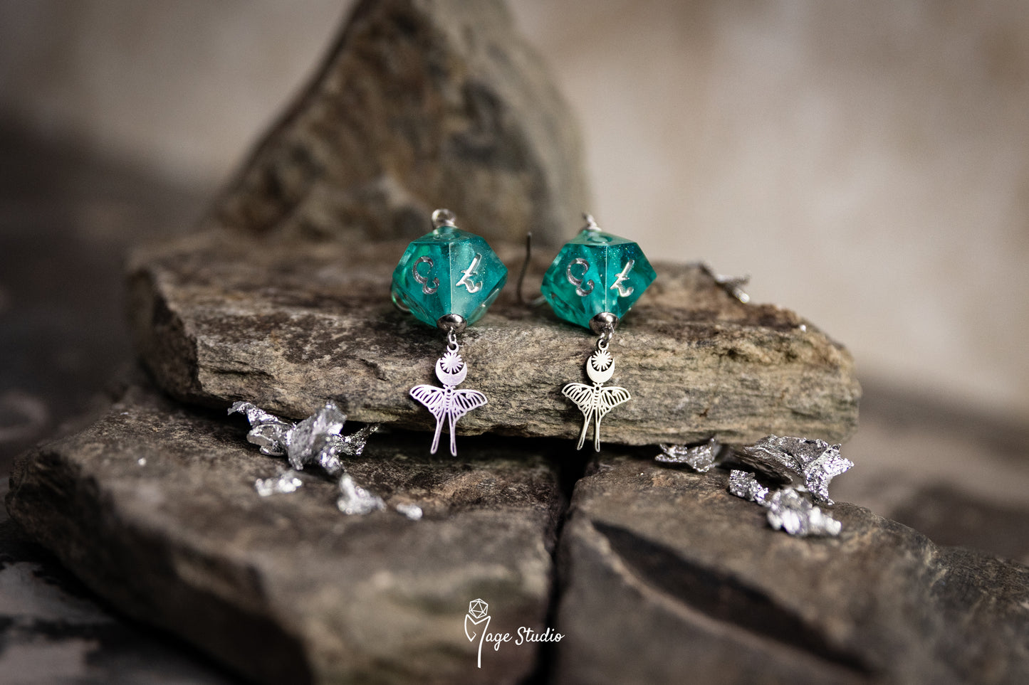 Luna Moth D10 dice earrings (silver-teal)